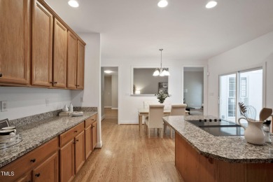 Live luxuriously in the heart of Holly Springs' sought-after on Devils Ridge Golf Club in North Carolina - for sale on GolfHomes.com, golf home, golf lot