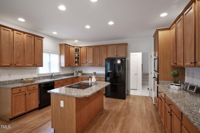 Live luxuriously in the heart of Holly Springs' sought-after on Devils Ridge Golf Club in North Carolina - for sale on GolfHomes.com, golf home, golf lot