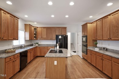 Live luxuriously in the heart of Holly Springs' sought-after on Devils Ridge Golf Club in North Carolina - for sale on GolfHomes.com, golf home, golf lot