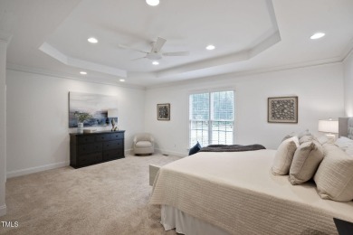 Live luxuriously in the heart of Holly Springs' sought-after on Devils Ridge Golf Club in North Carolina - for sale on GolfHomes.com, golf home, golf lot