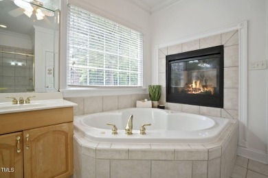 Live luxuriously in the heart of Holly Springs' sought-after on Devils Ridge Golf Club in North Carolina - for sale on GolfHomes.com, golf home, golf lot