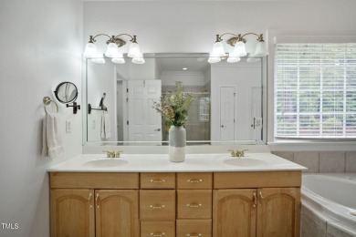 Live luxuriously in the heart of Holly Springs' sought-after on Devils Ridge Golf Club in North Carolina - for sale on GolfHomes.com, golf home, golf lot