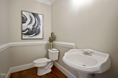 Live luxuriously in the heart of Holly Springs' sought-after on Devils Ridge Golf Club in North Carolina - for sale on GolfHomes.com, golf home, golf lot
