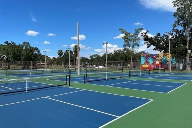 Charming and newly renovated 4-Bedroom, 3 Bathroom Home with on Rogers Park Golf Course in Florida - for sale on GolfHomes.com, golf home, golf lot