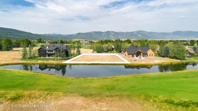 Discover serene mountain living in Teton Springs Golf & Casting on Teton Springs Resort and Club in Idaho - for sale on GolfHomes.com, golf home, golf lot