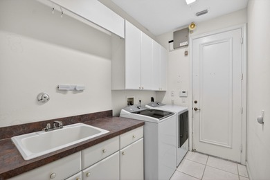 Located on an exceptional corner lot, this magnificent BAYVIEW on Wycliffe Golf and Country Club in Florida - for sale on GolfHomes.com, golf home, golf lot