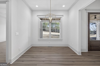 Welcome to this stunning new construction home in Harbor Club on Harbor Club Golf and Country Club in Georgia - for sale on GolfHomes.com, golf home, golf lot