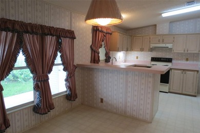 BETMAR ESTATES (55+ Community) 3BR/2BA/HUGE CARPORT Home with on Betmar Acres Golf Club in Florida - for sale on GolfHomes.com, golf home, golf lot