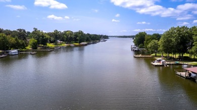 Spectacular 5 BR, 5 BA Lake Marion waterfront home with dock on Players Course At Wyboo Plantation in South Carolina - for sale on GolfHomes.com, golf home, golf lot