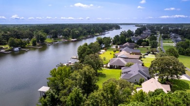 Spectacular 5 BR, 5 BA Lake Marion waterfront home with dock on Players Course At Wyboo Plantation in South Carolina - for sale on GolfHomes.com, golf home, golf lot