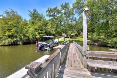 Spectacular 5 BR, 5 BA Lake Marion waterfront home with dock on Players Course At Wyboo Plantation in South Carolina - for sale on GolfHomes.com, golf home, golf lot