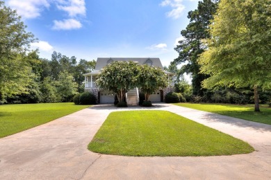 Spectacular 5 BR, 5 BA Lake Marion waterfront home with dock on Players Course At Wyboo Plantation in South Carolina - for sale on GolfHomes.com, golf home, golf lot