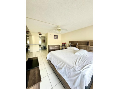 Lovely condo offers a perfect blend of comfort and convenience on Pembroke Lakes Golf Club in Florida - for sale on GolfHomes.com, golf home, golf lot