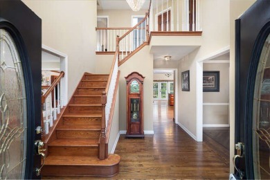 Welcome to this exquisite home nestled down a tree-lined street on White Eagle Golf Club in Illinois - for sale on GolfHomes.com, golf home, golf lot