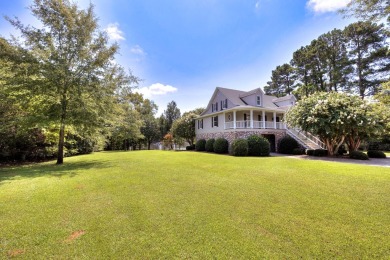 Spectacular 5 BR, 5 BA Lake Marion waterfront home with dock on Players Course At Wyboo Plantation in South Carolina - for sale on GolfHomes.com, golf home, golf lot