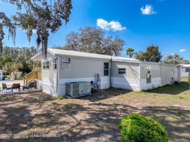 SNOWBIRDS OR HOMEOWNERS WELCOME- YOU OWN the land, The land is on Glen Lakes Country Club in Florida - for sale on GolfHomes.com, golf home, golf lot