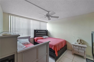 Lovely condo offers a perfect blend of comfort and convenience on Pembroke Lakes Golf Club in Florida - for sale on GolfHomes.com, golf home, golf lot