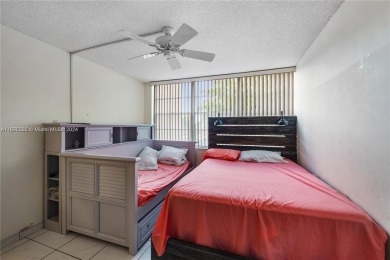 Lovely condo offers a perfect blend of comfort and convenience on Pembroke Lakes Golf Club in Florida - for sale on GolfHomes.com, golf home, golf lot