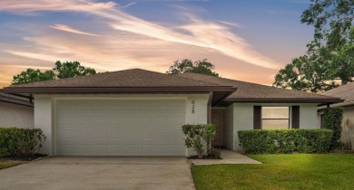 One or more photo(s) has been virtually staged. LIVE THE FLORIDA on Cypresswood Golf and Country Club in Florida - for sale on GolfHomes.com, golf home, golf lot