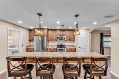 One or more photo(s) has been virtually staged. LIVE THE FLORIDA on Cypresswood Golf and Country Club in Florida - for sale on GolfHomes.com, golf home, golf lot