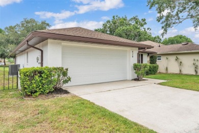 One or more photo(s) has been virtually staged. LIVE THE FLORIDA on Cypresswood Golf and Country Club in Florida - for sale on GolfHomes.com, golf home, golf lot