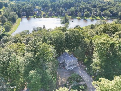 Wake up to the sounds of nature, unwind by the fire, and take in on The Hideout Golf in Pennsylvania - for sale on GolfHomes.com, golf home, golf lot