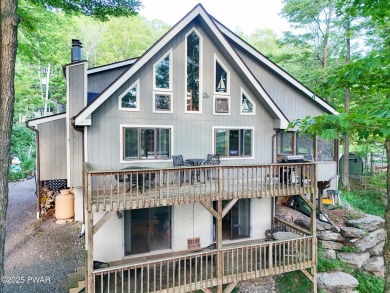 Wake up to the sounds of nature, unwind by the fire, and take in on The Hideout Golf in Pennsylvania - for sale on GolfHomes.com, golf home, golf lot