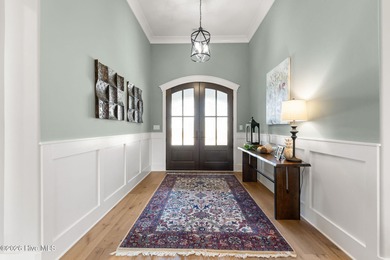 Designed by renowned builder George Crane and completed in 2023 on Members Club At St. James Plantation in North Carolina - for sale on GolfHomes.com, golf home, golf lot