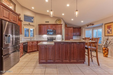 Beautifully customized home located on a golf course lot with on Tuscany Falls At Pebble Creek in Arizona - for sale on GolfHomes.com, golf home, golf lot