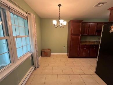 Enjoy your Retirement in this Sunny and Bright Greenbriar Condo on Leisure Village Golf Course in New York - for sale on GolfHomes.com, golf home, golf lot