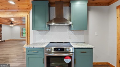 This beautifully updated home in Armuchee is conveniently on Stonebridge Golf Club in Georgia - for sale on GolfHomes.com, golf home, golf lot