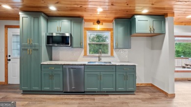 This beautifully updated home in Armuchee is conveniently on Stonebridge Golf Club in Georgia - for sale on GolfHomes.com, golf home, golf lot
