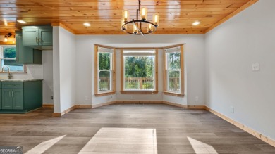 This beautifully updated home in Armuchee is conveniently on Stonebridge Golf Club in Georgia - for sale on GolfHomes.com, golf home, golf lot