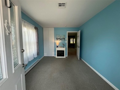 Enjoy your Retirement in this Sunny and Bright Greenbriar Condo on Leisure Village Golf Course in New York - for sale on GolfHomes.com, golf home, golf lot