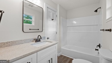 This beautifully updated home in Armuchee is conveniently on Stonebridge Golf Club in Georgia - for sale on GolfHomes.com, golf home, golf lot