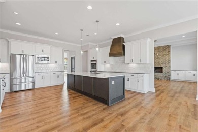 AMAZING OPPORTUNITY WITH RECENT PRICE IMPROVEMENT AND MOTIVATED on Traditions of Braselton Golf Club in Georgia - for sale on GolfHomes.com, golf home, golf lot