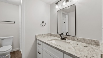This beautifully updated home in Armuchee is conveniently on Stonebridge Golf Club in Georgia - for sale on GolfHomes.com, golf home, golf lot
