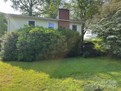 Nestled in the serene beauty of Lake Junaluska, this charming on Lake Junaluska Golf Course in North Carolina - for sale on GolfHomes.com, golf home, golf lot
