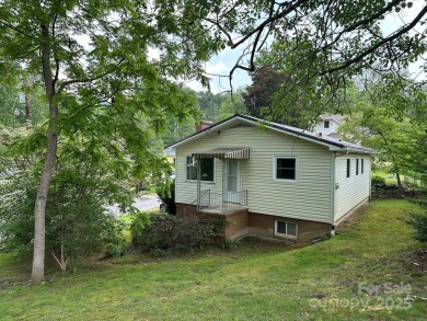 Nestled in the serene beauty of Lake Junaluska, this charming on Lake Junaluska Golf Course in North Carolina - for sale on GolfHomes.com, golf home, golf lot