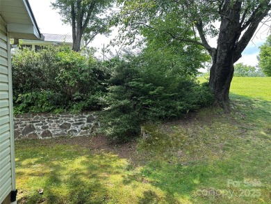 Nestled in the serene beauty of Lake Junaluska, this charming on Lake Junaluska Golf Course in North Carolina - for sale on GolfHomes.com, golf home, golf lot