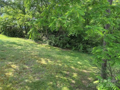 Nestled in the serene beauty of Lake Junaluska, this charming on Lake Junaluska Golf Course in North Carolina - for sale on GolfHomes.com, golf home, golf lot