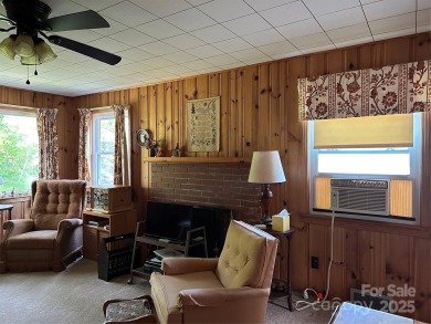 Nestled in the serene beauty of Lake Junaluska, this charming on Lake Junaluska Golf Course in North Carolina - for sale on GolfHomes.com, golf home, golf lot