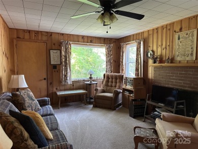 Nestled in the serene beauty of Lake Junaluska, this charming on Lake Junaluska Golf Course in North Carolina - for sale on GolfHomes.com, golf home, golf lot
