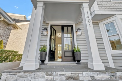 Commanding exceptional Intracoastal Waterway and golf course on Country Club of Landfall in North Carolina - for sale on GolfHomes.com, golf home, golf lot