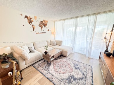 Updated top-floor 2BD/2BA condo with stunning lake views in the on Pine Island Ridge Country Club in Florida - for sale on GolfHomes.com, golf home, golf lot