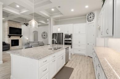 This beautifully designed home offers a blend of modern on Pecan Plantation Country Club in Texas - for sale on GolfHomes.com, golf home, golf lot