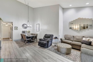 Remodeled 2/2 condo that lives like a home - Impact windows and on Woodmont Country Club in Florida - for sale on GolfHomes.com, golf home, golf lot