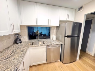 Updated top-floor 2BD/2BA condo with stunning lake views in the on Pine Island Ridge Country Club in Florida - for sale on GolfHomes.com, golf home, golf lot