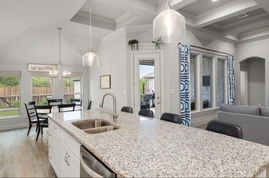 This beautifully designed home offers a blend of modern on Pecan Plantation Country Club in Texas - for sale on GolfHomes.com, golf home, golf lot