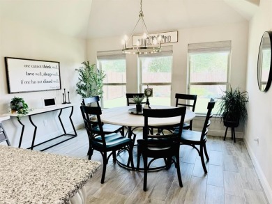 This beautifully designed home offers a blend of modern on Pecan Plantation Country Club in Texas - for sale on GolfHomes.com, golf home, golf lot